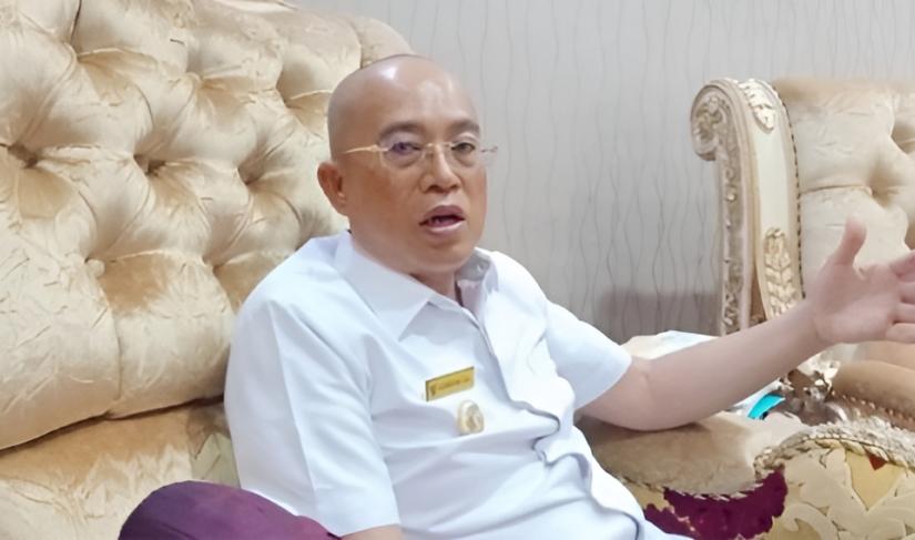 Bupati Gusnan Mulyadi.