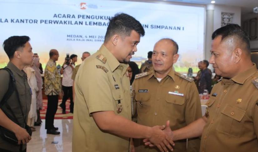 Gubernur Sumut Muhammad Bobby Afif Nasution mengukuhkan Kepala Kantor Perwakilan LPS I Wilayah Sumut, Senin 4/5/2026