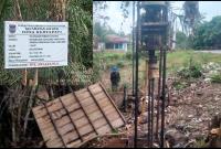 Lokasi pembangunan sumur bor disertai papan merk