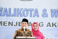 Dedy Wahyudi bersama sang istri dalam silaturahmi bersama Organisasi IKBKM di salah satu hotel di Kota Bengkulu.