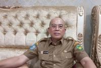 Bupati Gusnan Mulyadi.