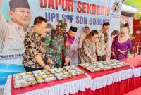 Pelaksanaan Makan Bergisi Gratis (MBG) dengan penerapan uji coba Dapur Sekolah di SDN Borong, Kec. Manggala, Kota Makassar, Kamis, (02/10/2025), lancar, tanpa ada kasus keracunan.